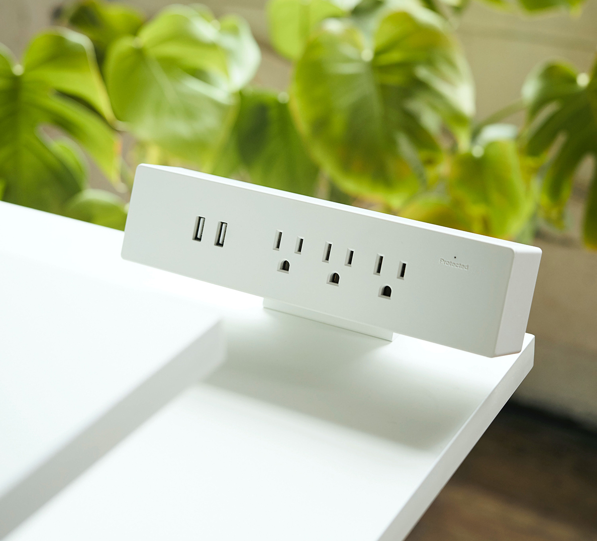A USB charging station in a modern living room.
