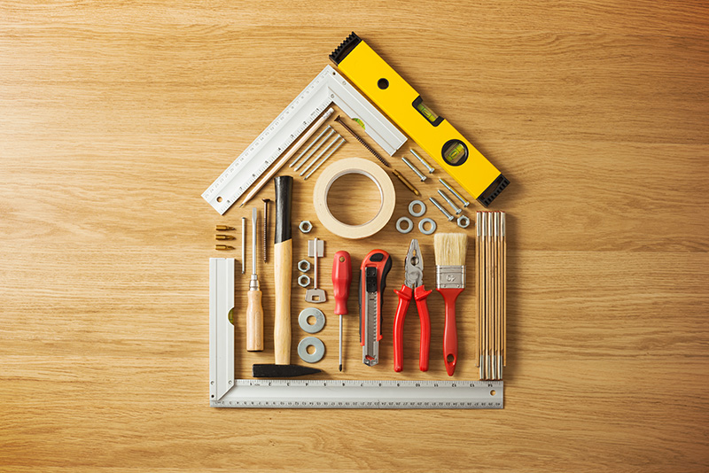 home upgrading tools setup in the shape of a house